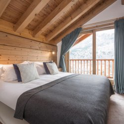 A bedroom in Chalet Iamato in Meribel Village