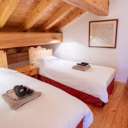 A Comfortable bedroom in Chalet Mira Belum Meribel
