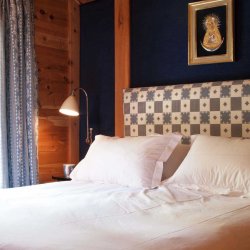 One of the comfortable bedrooms in Chalet La Varappe in Meribel