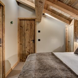 A bedroom in Chalet Bergeronnette Meribel Nantgerel