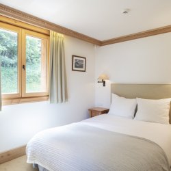 A double Bedroom in Chalet Foret Meribel