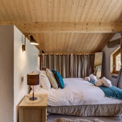 The Master bedroom in Chalet La Chouette Meribel