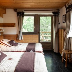 One of the bedrooms in Chalet La Fugue in Meribel