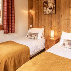 A Twin bedroom in Chalet Blanchot Meribel