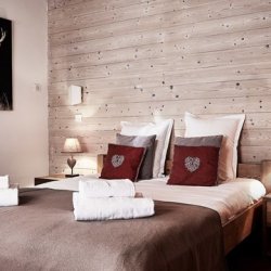 A Double bedroom in Chalet Le Bouquetin in Meribel