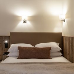 A Bedrrom in Chalet Apartment Le Cygne Meribel Centre