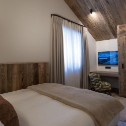 A Bedrrom in Chalet Apartment Le Cygne Meribel Centre