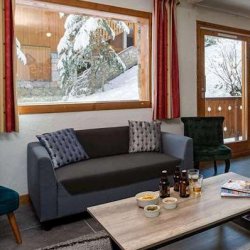 The living and dining area in Chalet Nico Meribel Mottaret