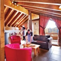 The Living and dining area in Chalet Mathilde, Val Thorens