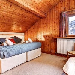 One of the bedrooms in Chalet Cecilia Meribel