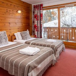 A Twin bedroom in Chalet Nico Meribel Mottaret