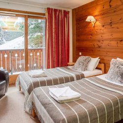 One of the Twin bedrooms in Chalet Natalette II Meribel Mottaret