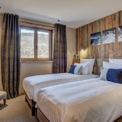 One of the bedrooms in Chalet Bergeronnette in Meribel Nantgerel