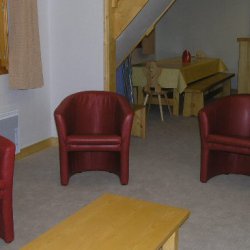 The living, dining and kitchen area in apartment Aubepine