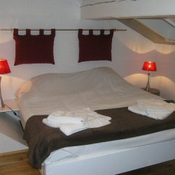 One of the double bedrooms in apartment Le Centre in Meribel