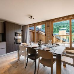 The Kitchen and dining area in Apartment Le Glaciers 12 Meribel