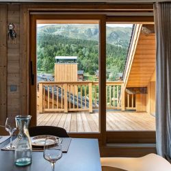 The dining area and terrace in Apartment Le Glaciers 12 Meribel