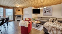 The Living and dining area in Catered Chalet Petit Sabot Val Thorens