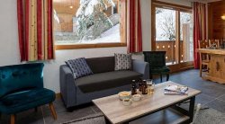 The living and dining area in Chalet Nico Meribel Mottaret