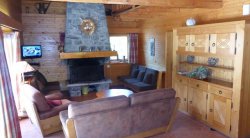 Comfortable living room with fireplace in Chalet La Renarde